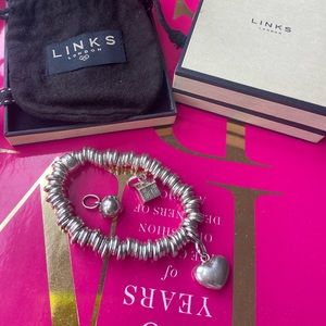Links of London sweetie bracelet + 3 charms. House, heart and world